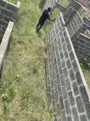Uncompleted Structure on a 72 by 99 Plot of Land