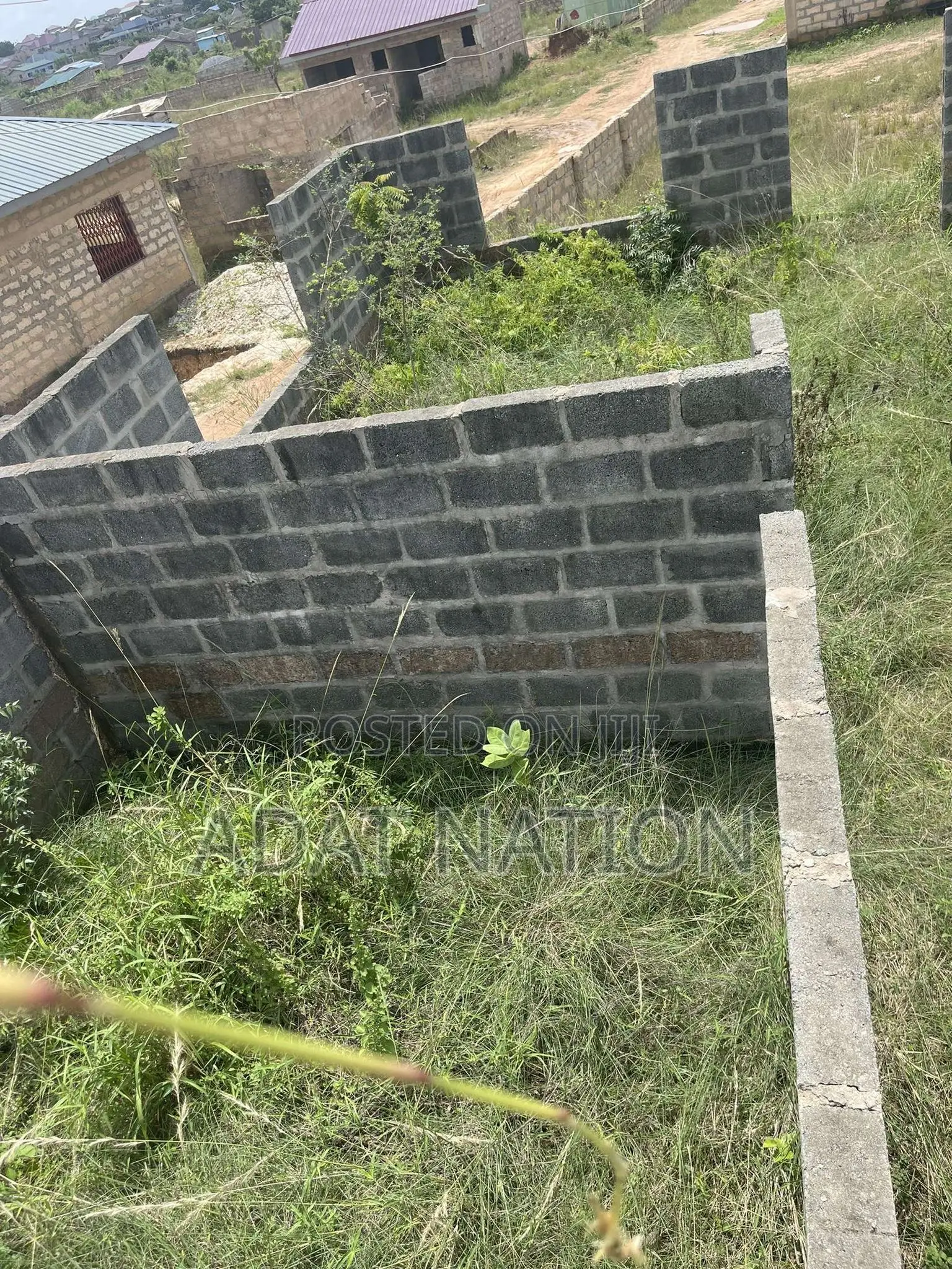 Uncompleted Structure on a 72 by 99 Plot of Land
