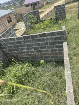 Uncompleted Structure on a 72 by 99 Plot of Land