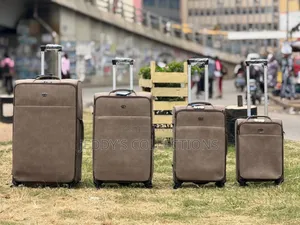Genuine 4 Set Trolling Travelling Leather With a Large Compartment