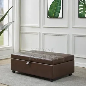 Emorie Sleeper Ottoman Covered in a Rich Brown “Leather-Like” Fabric