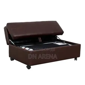 Emorie Sleeper Ottoman Covered in a Rich Brown “Leather-Like” Fabric