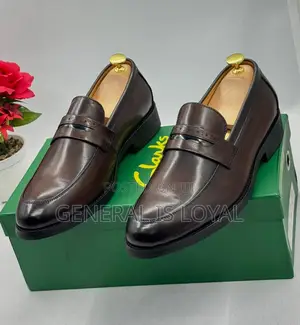 Clarks Men's Brown Leather Penny Loafers.