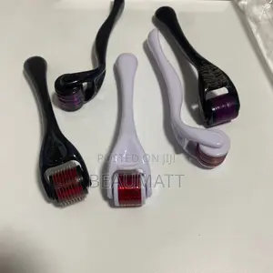 Rose Quartz Facial + Derma Roller System In Its Packaging