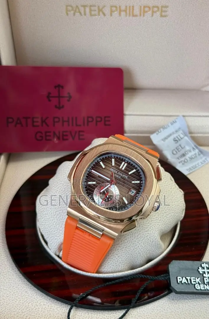 Patek Philippe Nautilus Chronograph Mens Orange Strap Watch