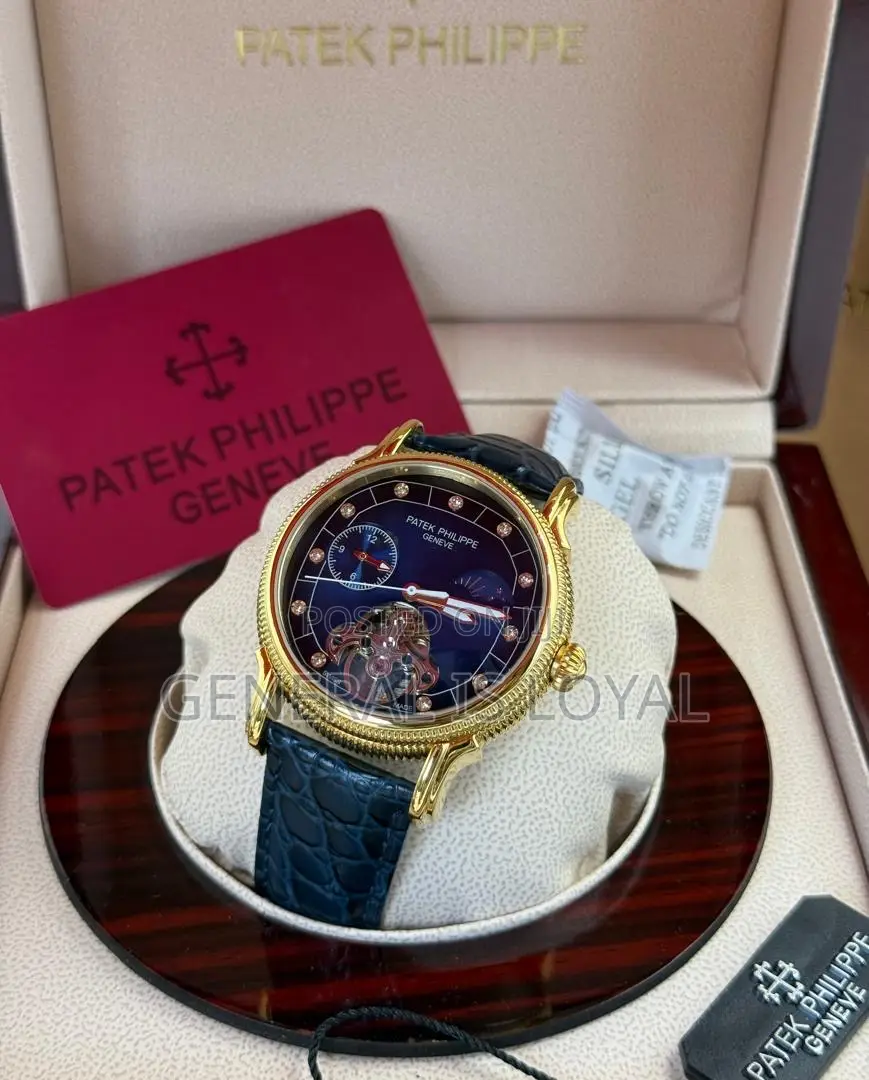 Patek Philippe Automatic Watch With A Brown Leather Strap