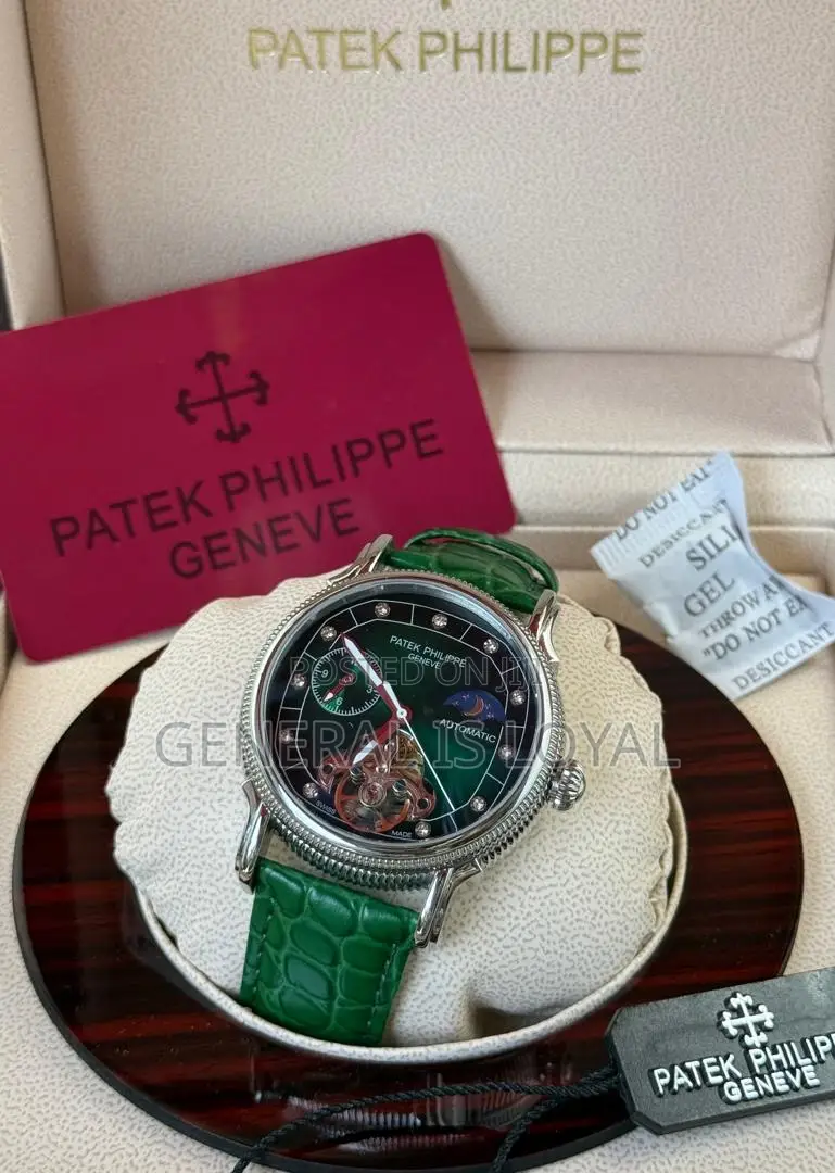 Patek Philippe Automatic Watch With A Brown Leather Strap