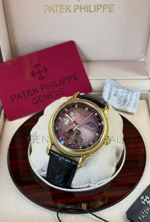 Patek Philippe Automatic Watch With A Brown Leather Strap