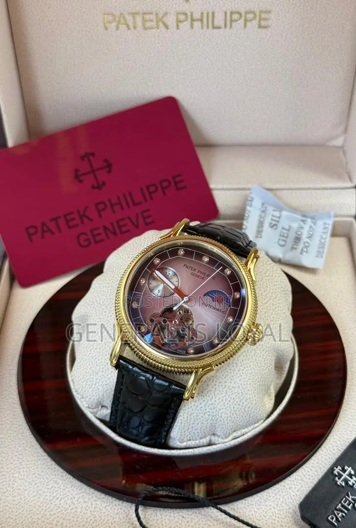 Patek Philippe Automatic Watch With A Brown Leather Strap
