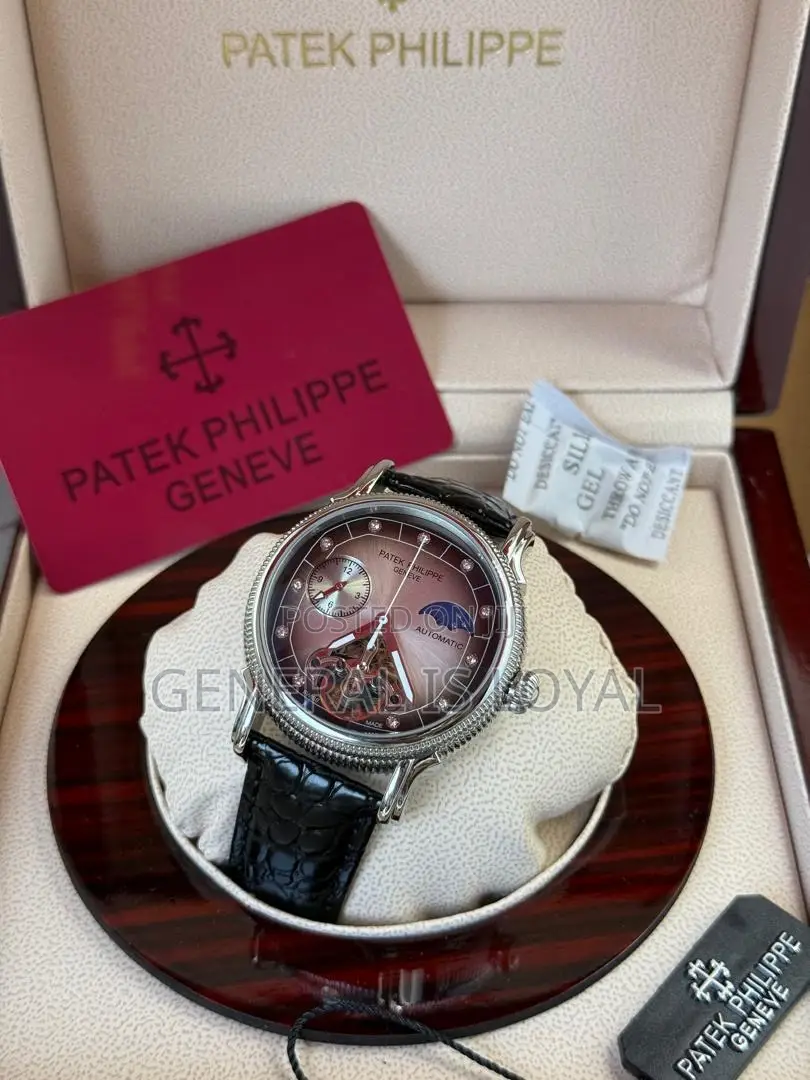 Patek Philippe Automatic Watch With A Brown Leather Strap