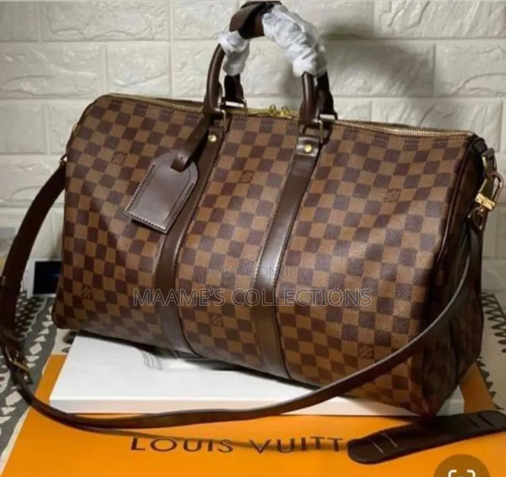 Louis Vuitton Keepall Bandoulière Duffle Bag.