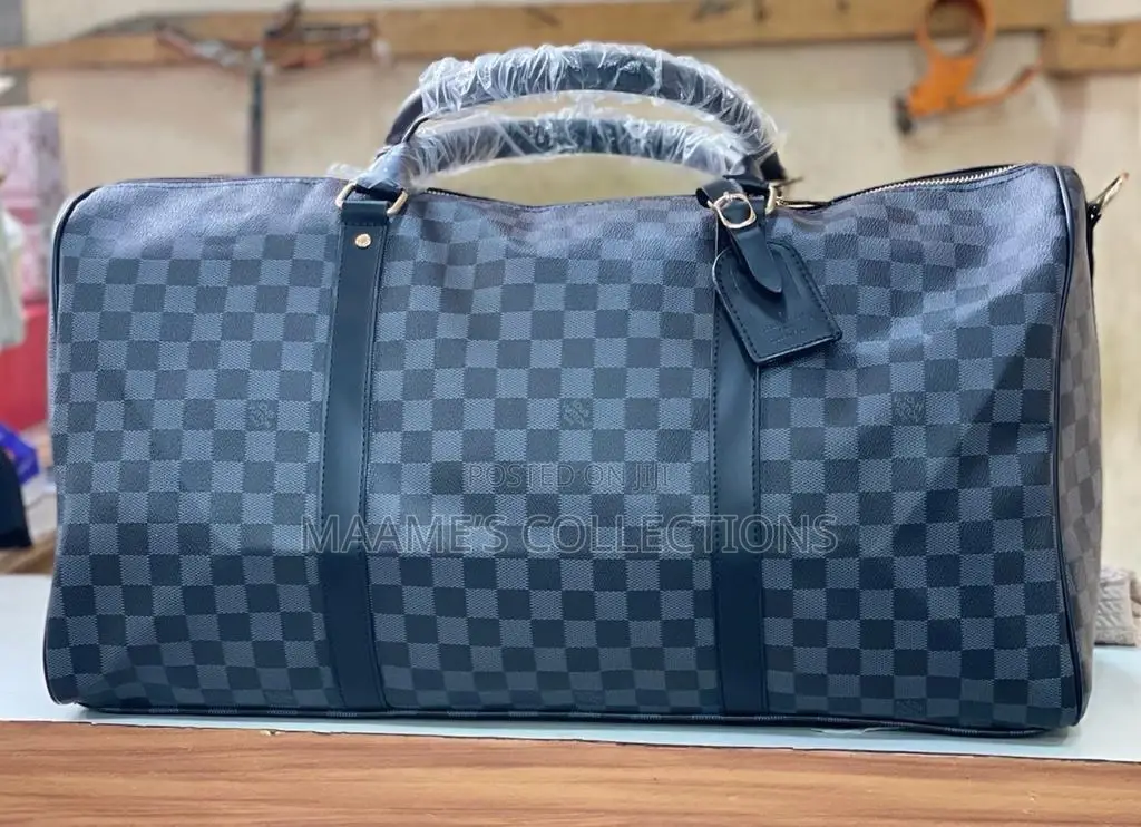 Louis Vuitton Keepall Bandoulière Duffle Bag.