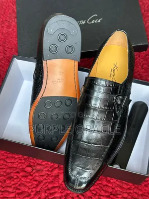 Stylish and Modern Pair of Black Kennett Cole Loafer