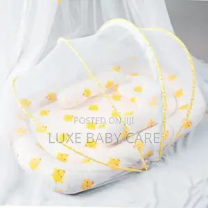Portable Baby Bed With an Integrated Mosquito Net.