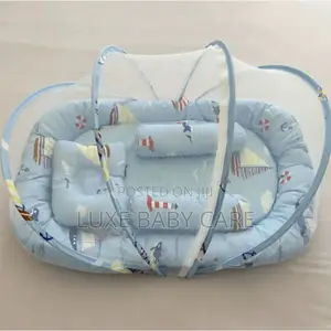 Portable Baby Bed With an Integrated Mosquito Net.