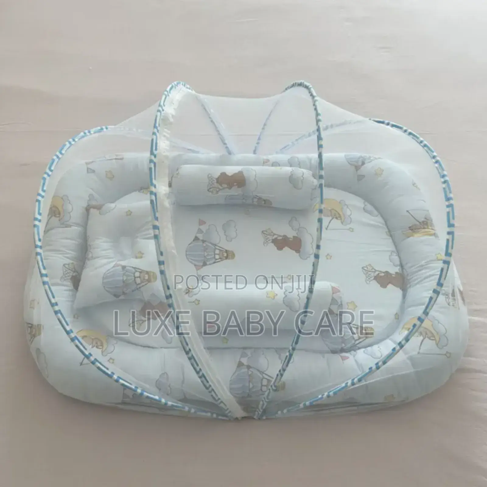Portable Baby Bed With an Integrated Mosquito Net.