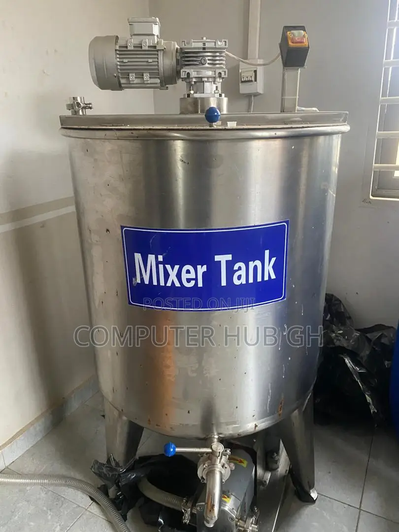 Automatic 4 Head Liquids Filling Machine With Mixer Tank