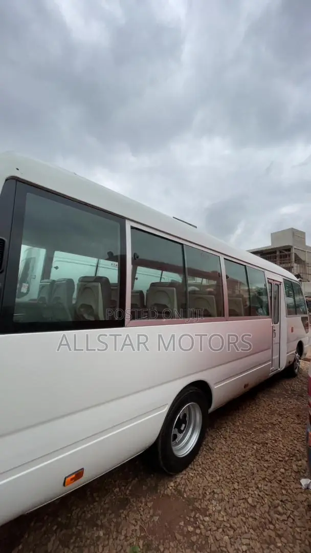 Toyota Coaster 2012 Yellow