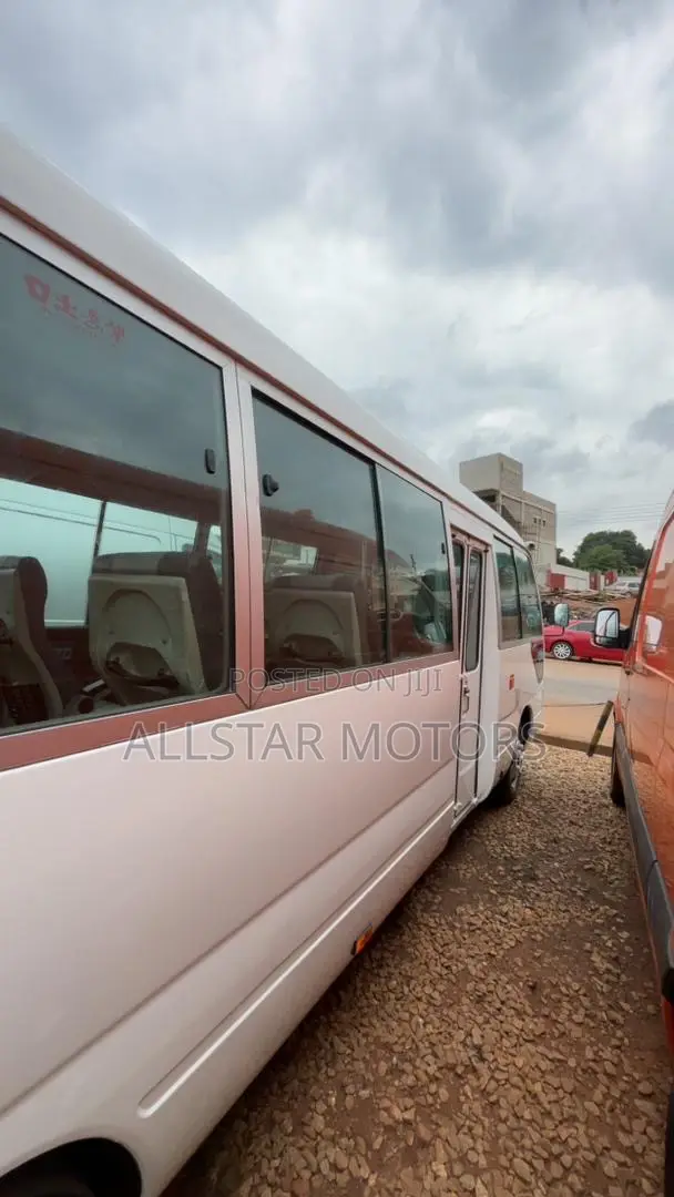 Toyota Coaster 2012 Yellow