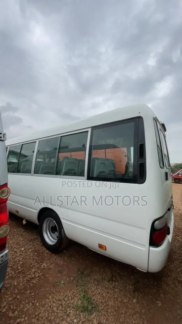 Toyota Coaster 2012 Yellow