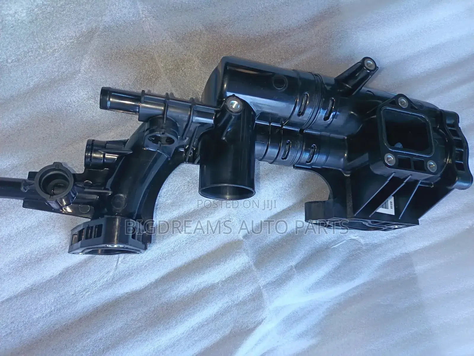 Hyundai/Kia Thermostat Housing.