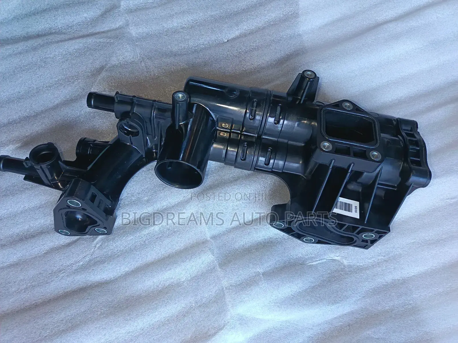 Hyundai/Kia Thermostat Housing.