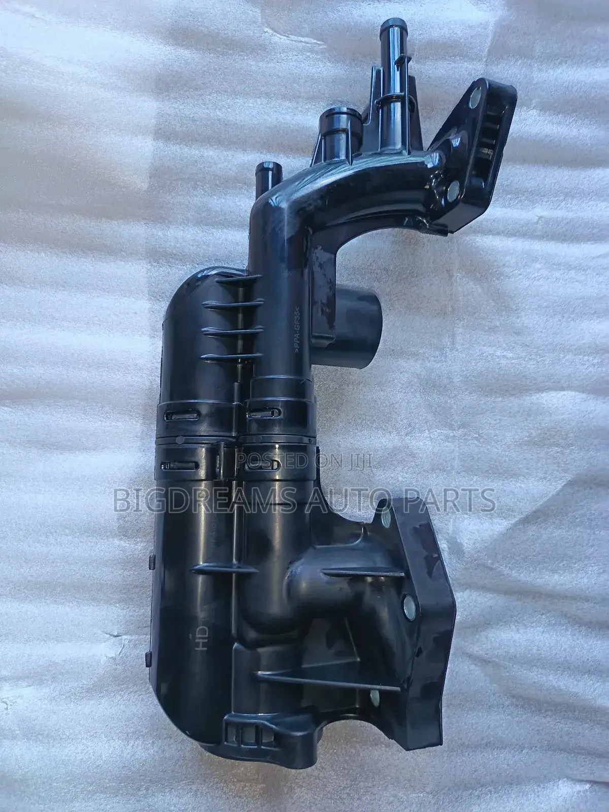 Hyundai/Kia Thermostat Housing.