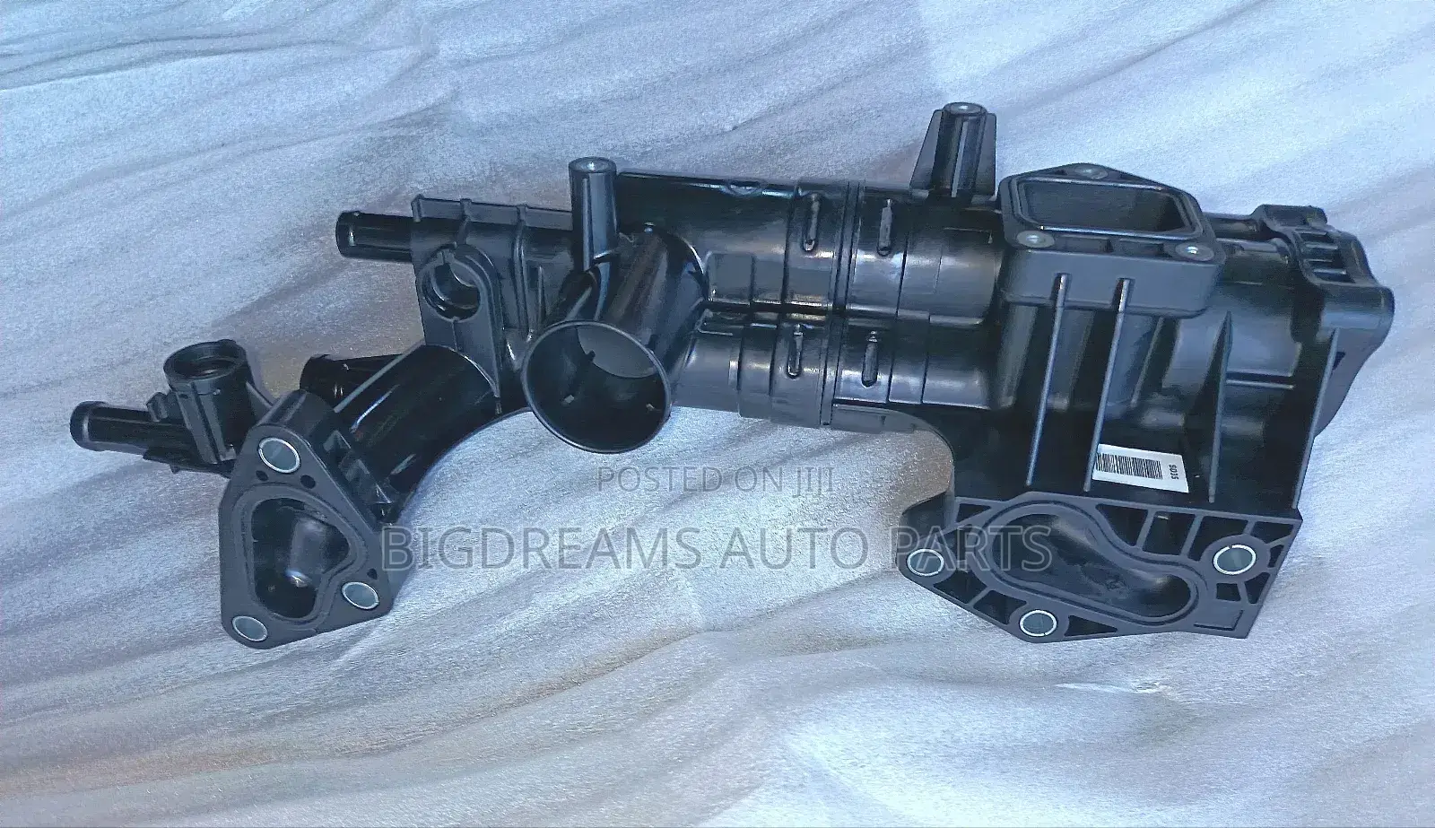 Hyundai/Kia Thermostat Housing.