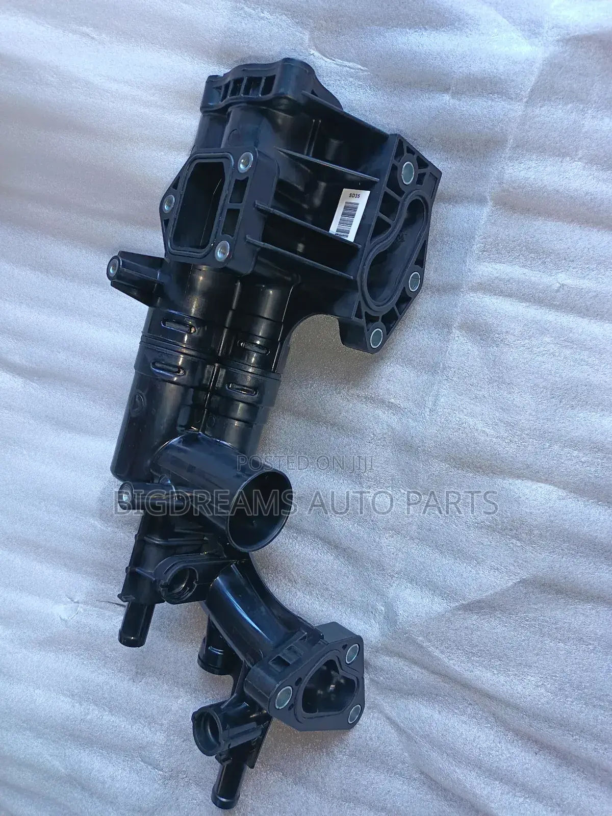 Hyundai/Kia Thermostat Housing.