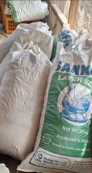 Empty Chicken Feed Sacks .