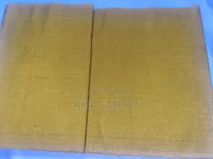 Beautiful 2yards Gold Shimmer Material Kente Available .