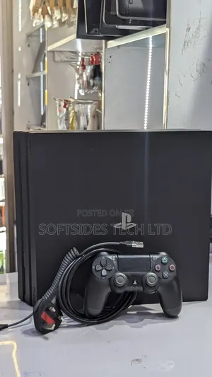 Very Neat Playstation 4 Pro With 15 Games and Accessories Shop Tested.