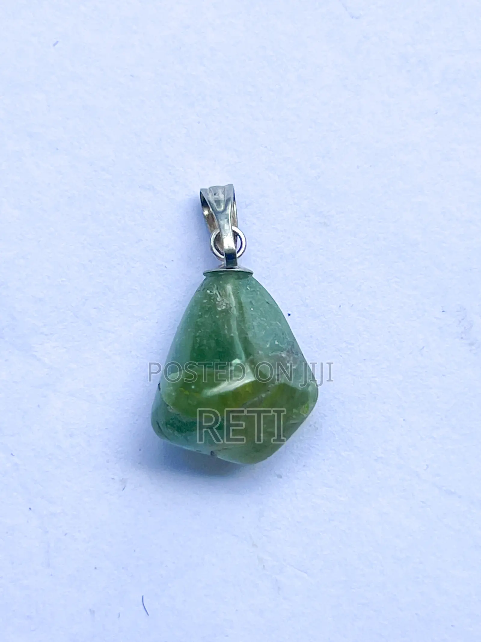 Sold Small Peridot. The Green Money Stone.