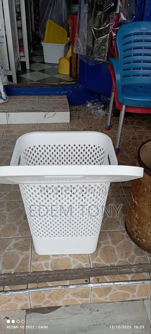 White Plastic Laundry Basket With a Lid