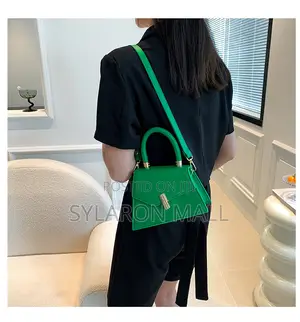 Emerald Twist Top Handle Mini Bag