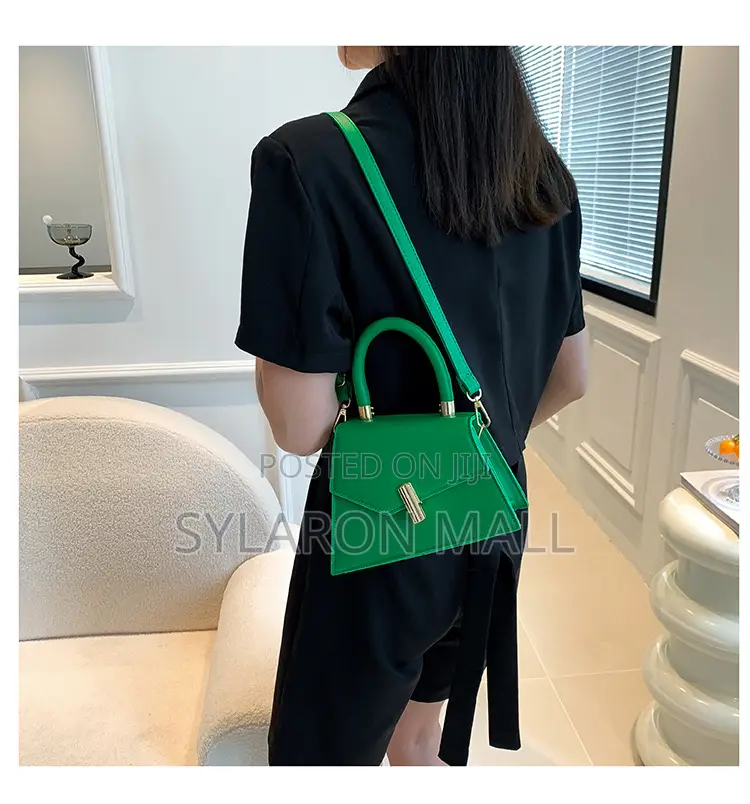Emerald Twist Top Handle Mini Bag