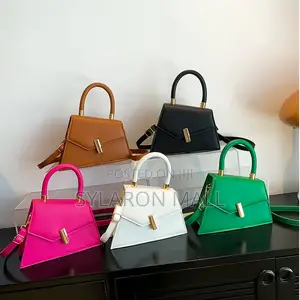 Emerald Twist Top Handle Mini Bag