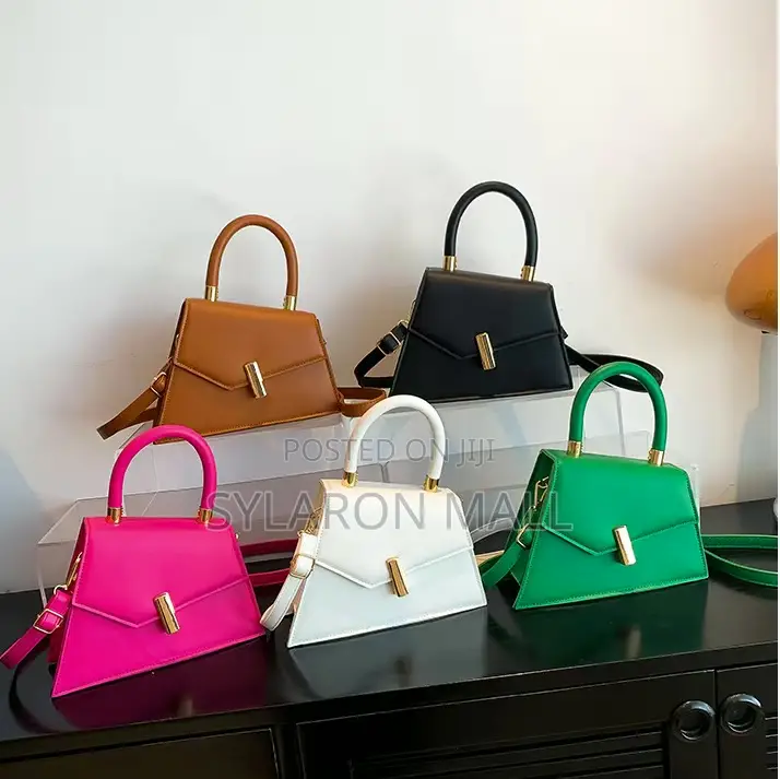 Emerald Twist Top Handle Mini Bag