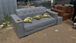 Ash Leather Sofa With Golden Pilos