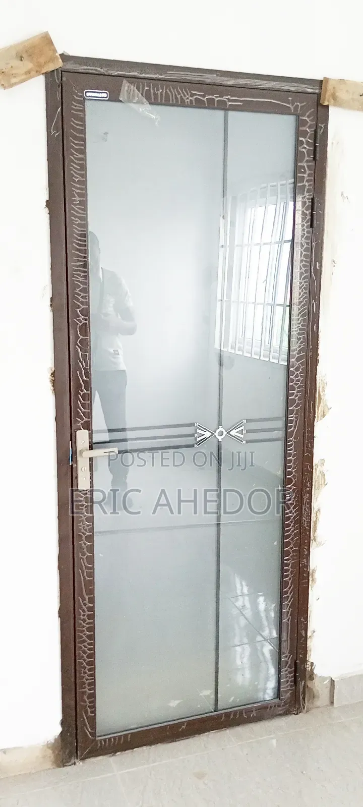 Brown Design Outside Open Glass Door and Accessories