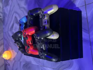 Ps4 Standard 500gb + 8 Games (Includes Fc 26)