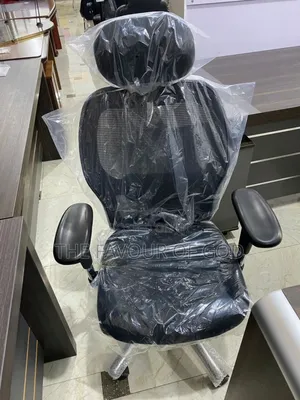 An Authentic Swivel Chair With Head