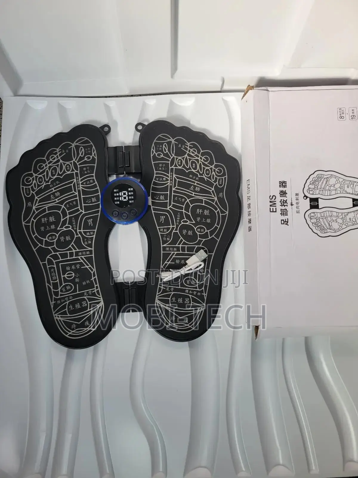 Ems (Electrical Muscle Stimulation) Foot Massager.