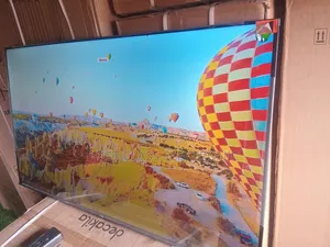 Watch in Brilliance With TCL 55” Smart Tv.