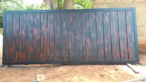 Modern Metal Gate With Wood-Look Finish | Custom Made