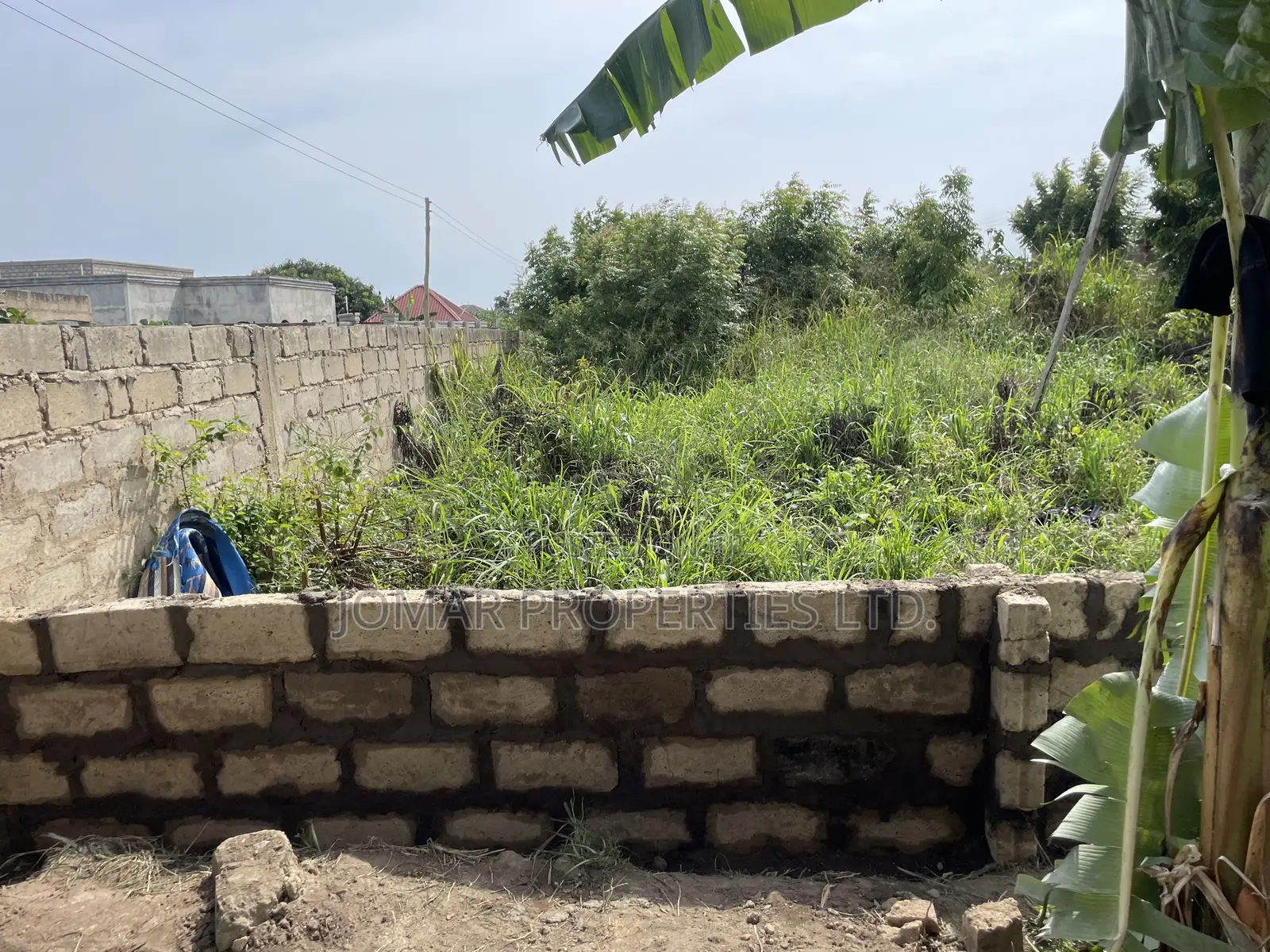 Fenced Land For Sale At Ashalaja