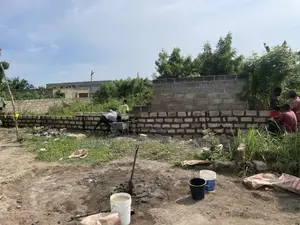 Fenced Land For Sale At Ashalaja