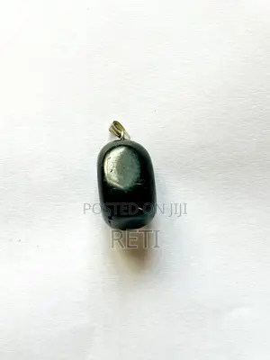Jet Stone ( Like Amber, Pulls Out Bad Energy From You Into Itself )