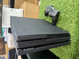 Playstation 4 Pro Console Display With One Controller and One Cd