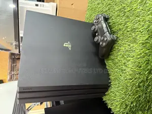 Playstation 4 Pro Console Display With One Controller and One Cd
